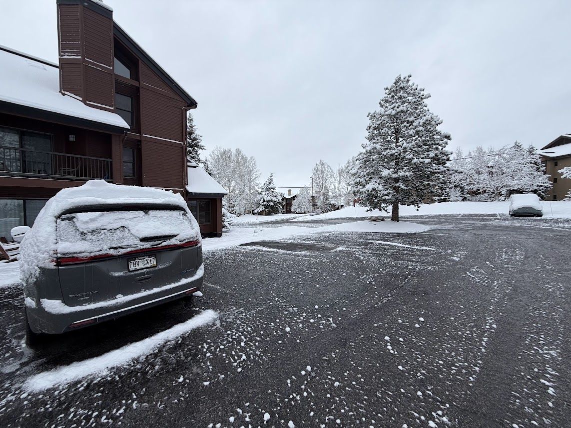 Steamboat Springs trip — Pacifica under snow at Timber Run condo parking lot